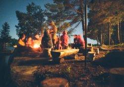 Sitting together around a bonfire